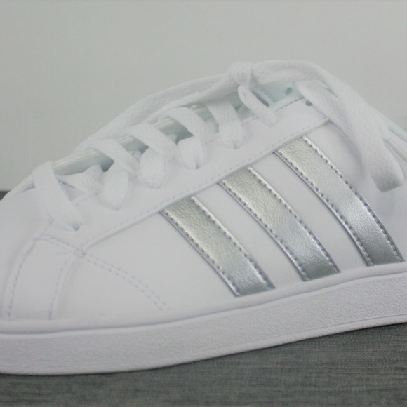 white adidas trainers with silver stripes